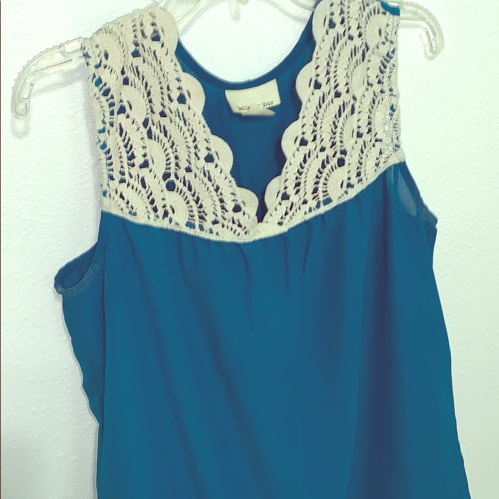 Teal sleeveless blouse